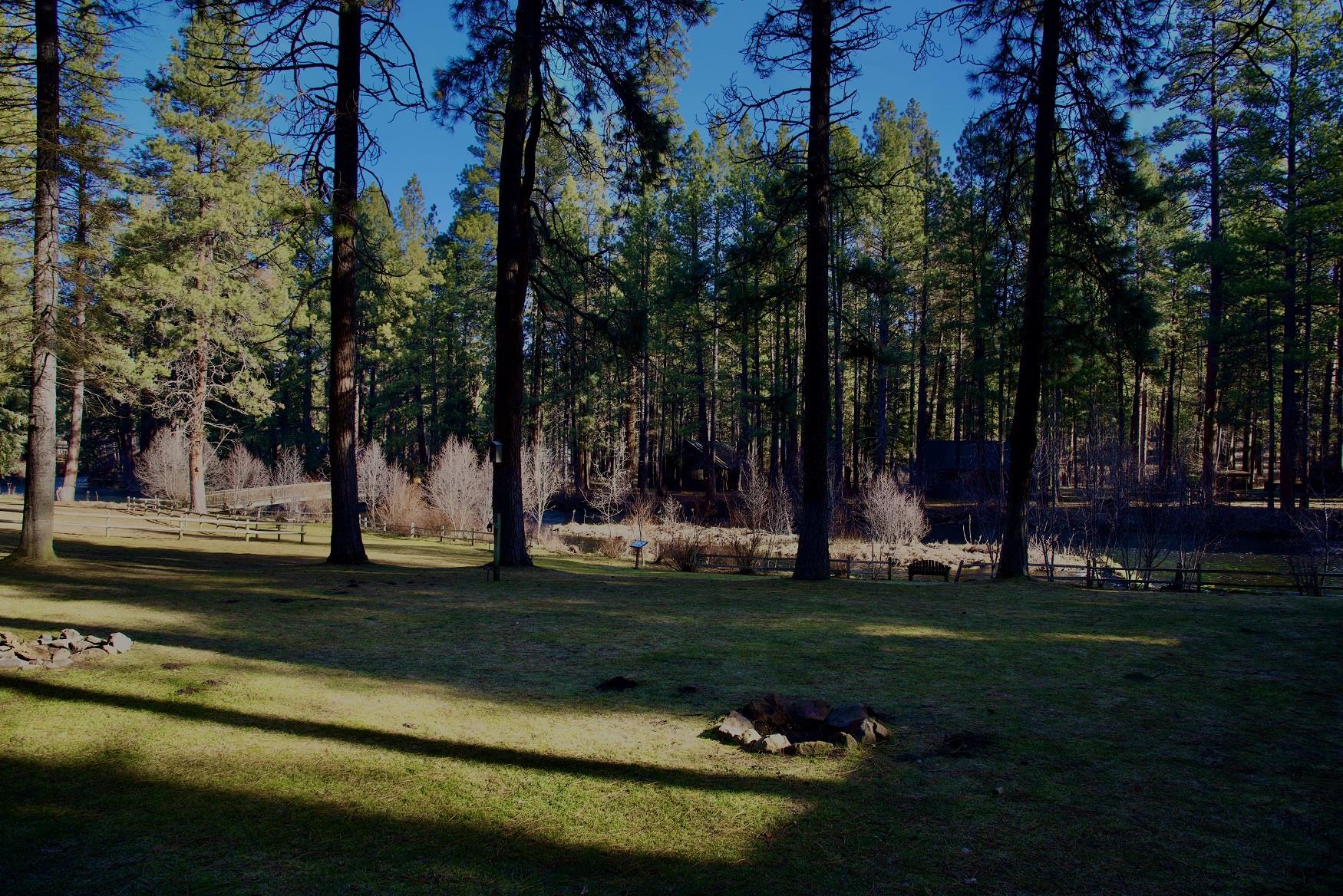 A perfect view of the Metolius River, off the deck of Aspen Cabin, at Cold Springs Resort in Camp Sherman, Oregon