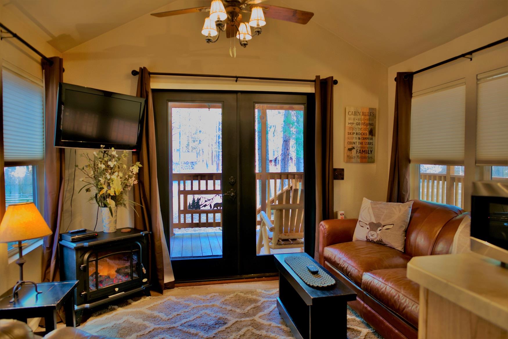 The living room of Juniper Cabin at Cold Springs Resort & RV Park in Camp Sherman, Oregon